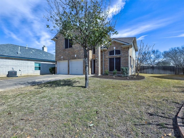 view of front facade featuring driveway, brick siding, an attached garage, fence, and a front yard