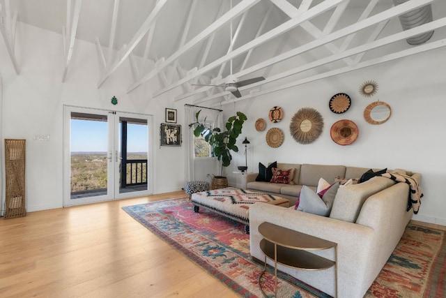 200 Hilltop Dr, Dripping Springs, TX 78620 - living area featuring high vaulted ceiling, wood finished floors, and beam ceiling