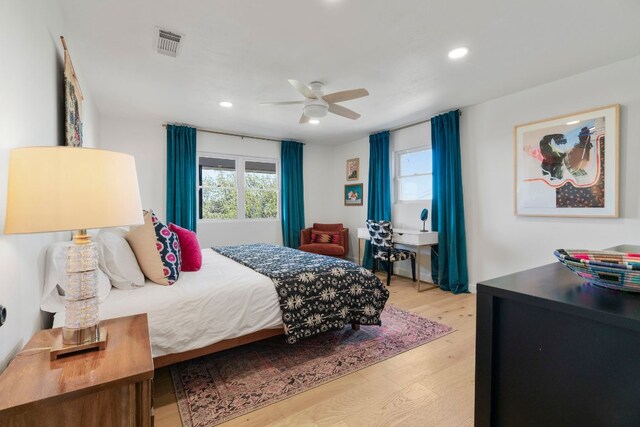 200 Hilltop Dr, Dripping Springs, TX 78620 - bedroom with light wood-style floors, recessed lighting, and ceiling fan