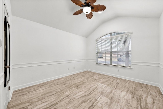 701 Portchester Castle Path, Pflugerville, TX 78660 - empty room featuring a ceiling fan, vaulted ceiling, and baseboards