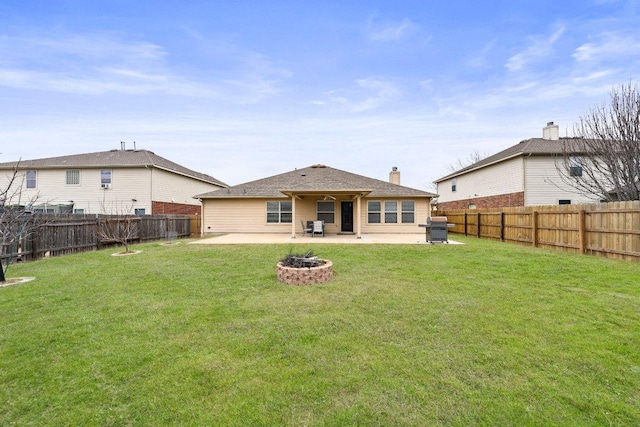 701 Portchester Castle Path, Pflugerville, TX 78660 - rear view of house featuring a patio area and an outdoor fire pit