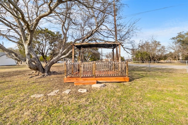 view of yard featuring a deck and a gazebo