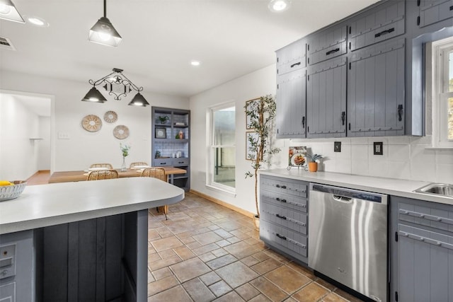 kitchen featuring recessed lighting, light countertops, gray cabinets, decorative backsplash, and dishwasher