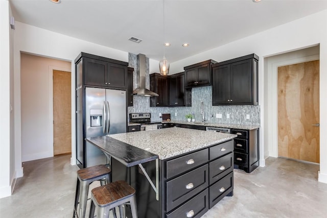 14805 Foy Dr, Austin, TX 78734 - kitchen featuring wall chimney exhaust hood, stainless steel appliances, finished concrete floors, decorative backsplash, and a breakfast bar area