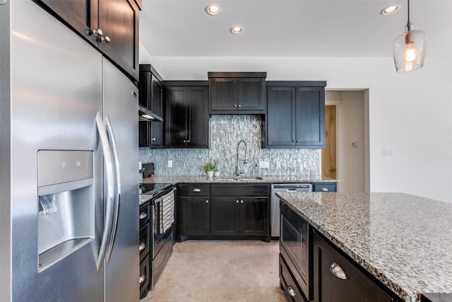 14805 Foy Dr, Austin, TX 78734 - kitchen with stainless steel appliances, tasteful backsplash, light stone countertops, recessed lighting, and pendant lighting