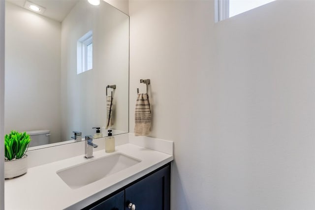 14805 Foy Dr, Austin, TX 78734 - half bathroom featuring vanity and healthy amount of natural light