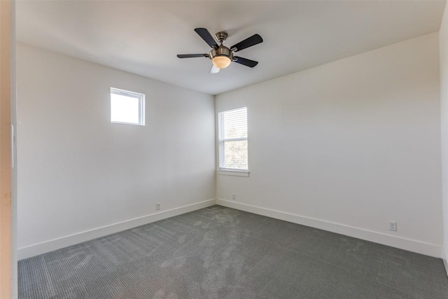 14805 Foy Dr, Austin, TX 78734 - spare room with healthy amount of natural light, dark colored carpet, and ceiling fan