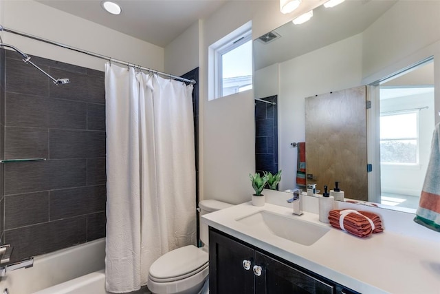14805 Foy Dr, Austin, TX 78734 - full bath with healthy amount of natural light, vanity, and shower / bath combination with curtain