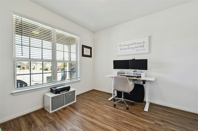 office area featuring baseboards and dark wood finished floors