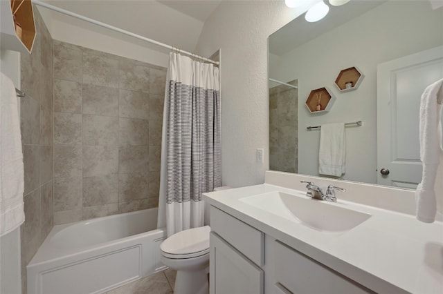 full bath featuring shower / tub combo, tile patterned flooring, vanity, and toilet