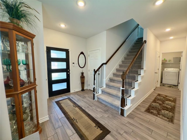 171 Longstraw Dr, Buda, TX 78610 - entrance foyer featuring stairs, wood finished floors, baseboards, and recessed lighting