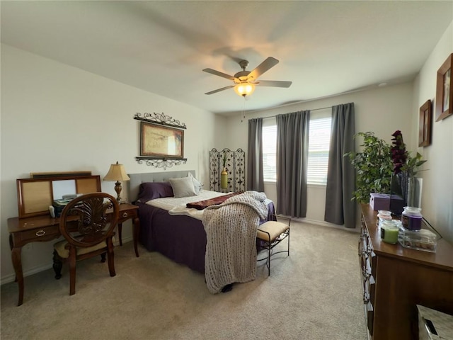 171 Longstraw Dr, Buda, TX 78610 - bedroom featuring light carpet, a ceiling fan, and baseboards