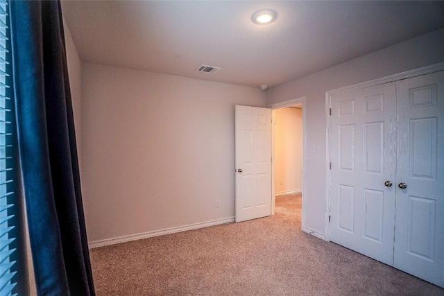 171 Longstraw Dr, Buda, TX 78610 - unfurnished bedroom with carpet, baseboards, and a closet