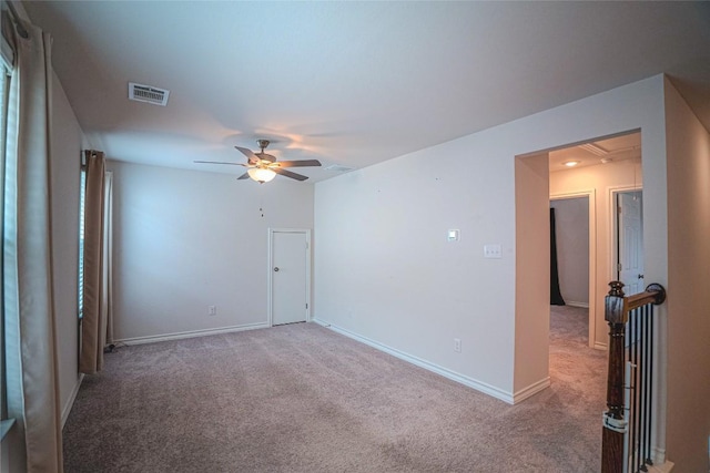 171 Longstraw Dr, Buda, TX 78610 - carpeted empty room featuring attic access, a ceiling fan, and baseboards