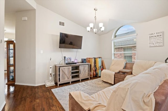 living room featuring an inviting chandelier, baseboards, vaulted ceiling, and wood finished floors