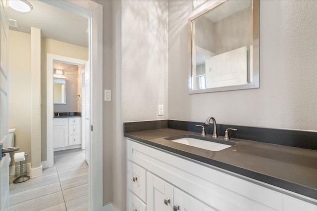 3011 Chisholm Trl, Austin, TX 78734 - bathroom with vanity and tile patterned flooring