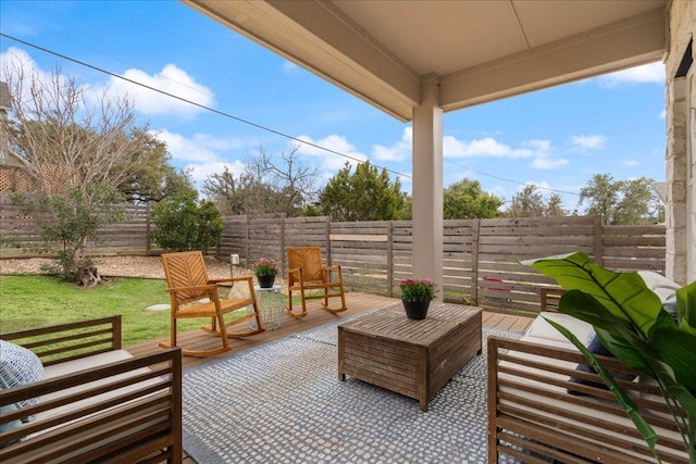 view of patio featuring a fenced backyard and outdoor lounge area