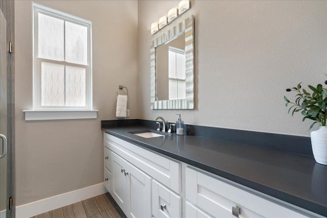 3011 Chisholm Trl, Austin, TX 78734 - bathroom featuring vanity and baseboards