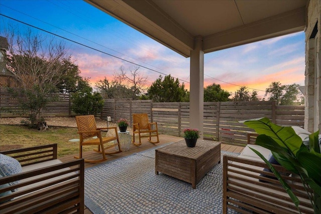 view of patio with an outdoor hangout area and a fenced backyard