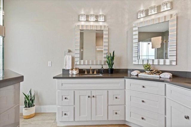 3011 Chisholm Trl, Austin, TX 78734 - bathroom featuring vanity and baseboards