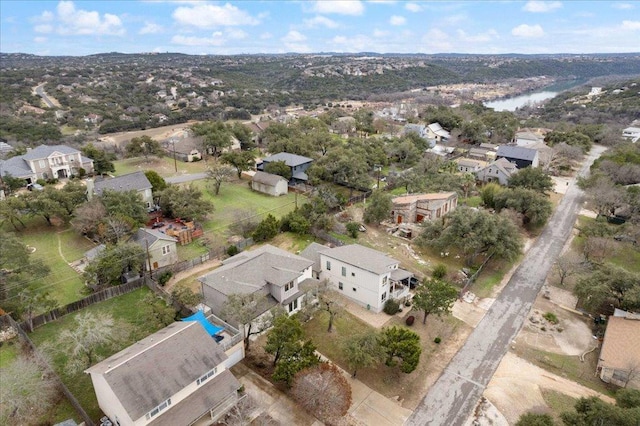 aerial view with a residential view and a water view