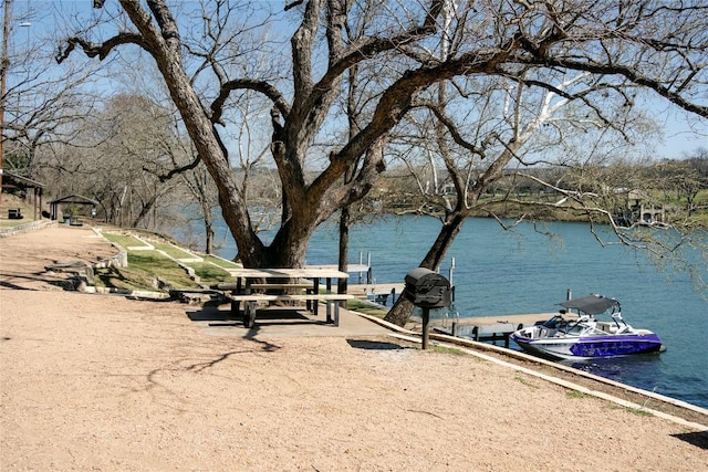 view of water feature with a dock