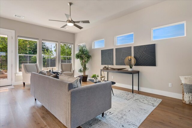3011 Chisholm Trl, Austin, TX 78734 - living room with a ceiling fan, healthy amount of natural light, and wood finished floors