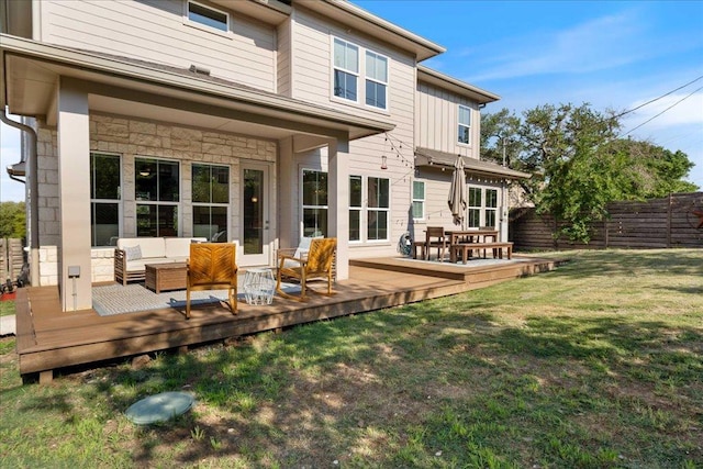 3011 Chisholm Trl, Austin, TX 78734 - back of property featuring outdoor lounge area, a deck, and stone siding