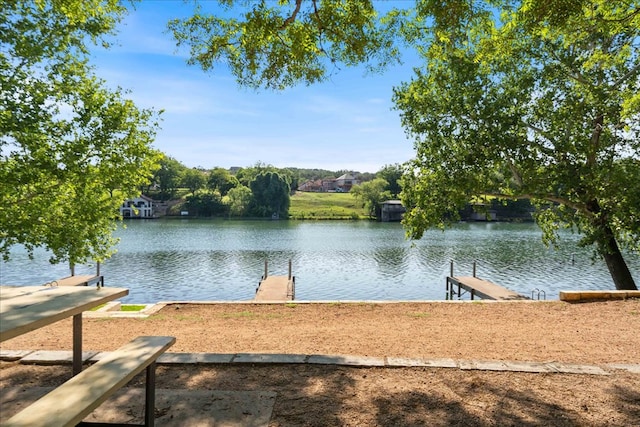 3011 Chisholm Trl, Austin, TX 78734 - view of community with a water view and a dock