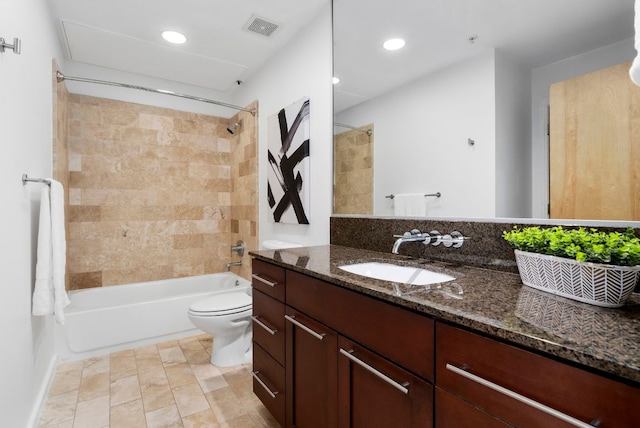 bathroom with toilet, recessed lighting, vanity, visible vents, and washtub / shower combination