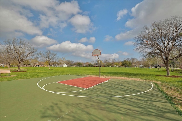 view of sport court with community basketball court and a lawn