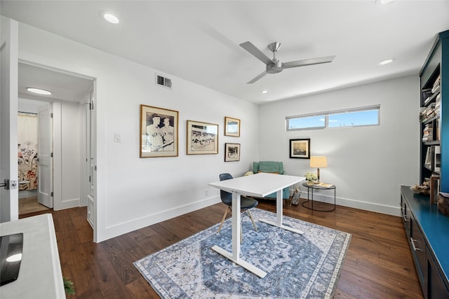 home office with recessed lighting, dark wood-type flooring, a ceiling fan, visible vents, and baseboards