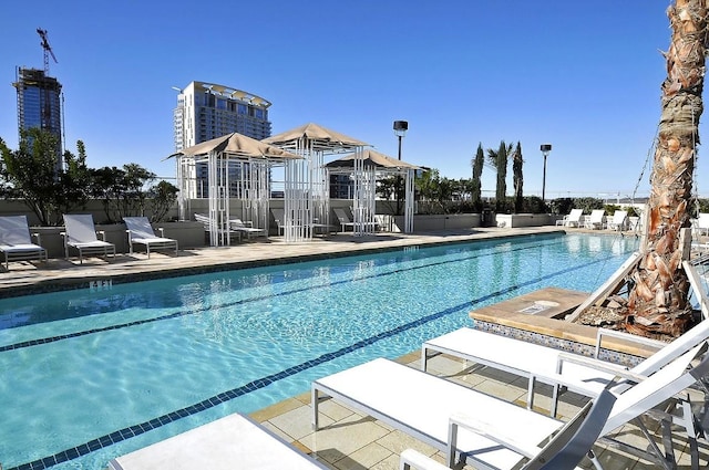 pool with a patio area