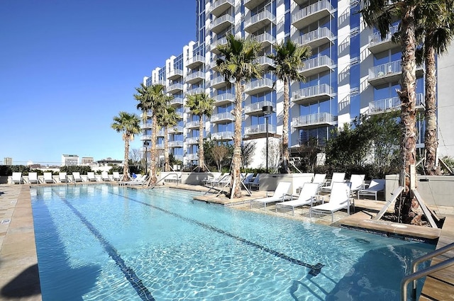 pool with a patio area