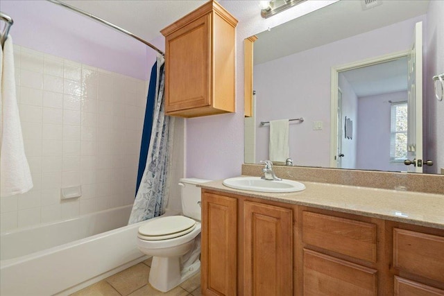 full bath with toilet, tile patterned flooring, shower / bathtub combination with curtain, and vanity