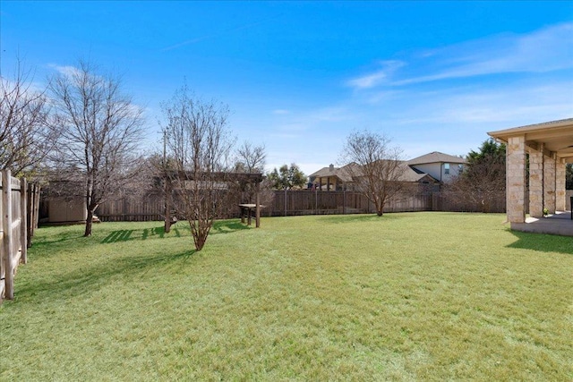 view of yard featuring a fenced backyard