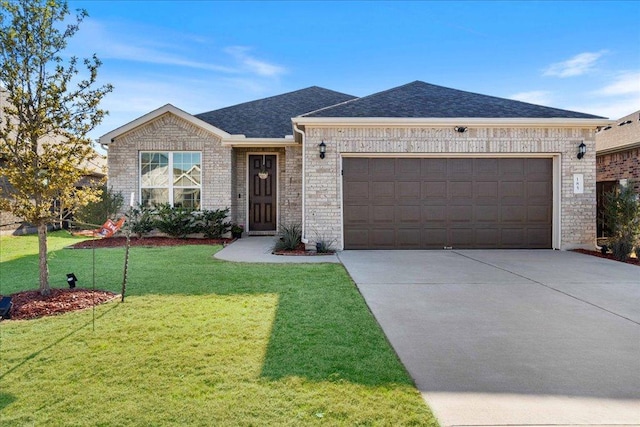 185 Slenderleaf Dr, Marble Falls, TX 78654 - ranch-style home featuring concrete driveway, a garage, a front yard, brick siding, and a shingled roof