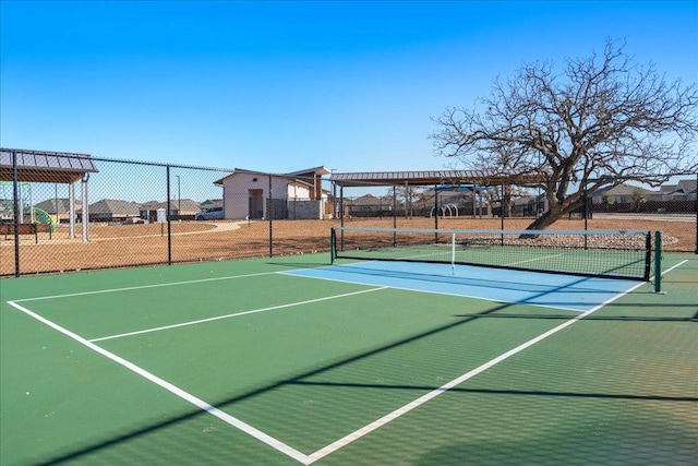 view of sport court with community basketball court and fence