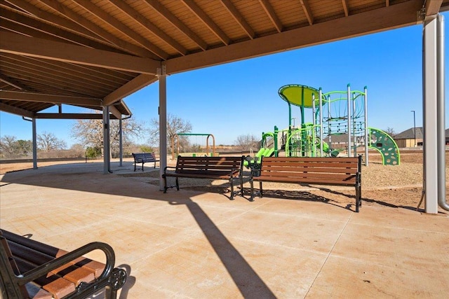 view of patio featuring playground community