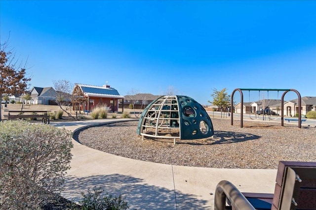 185 Slenderleaf Dr, Marble Falls, TX 78654 - community play area featuring a residential view
