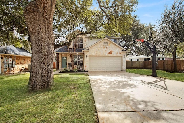 traditional-style house with an attached garage, fence, concrete driveway, stone siding, and a front lawn