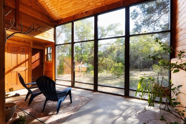 603 N Tumbleweed Trl, Austin, TX 78733 - sunroom / solarium featuring lofted ceiling and plenty of natural light