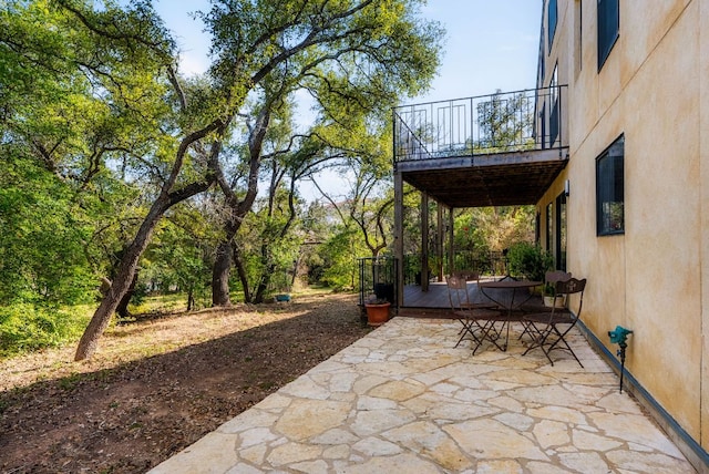 view of patio / terrace with a balcony