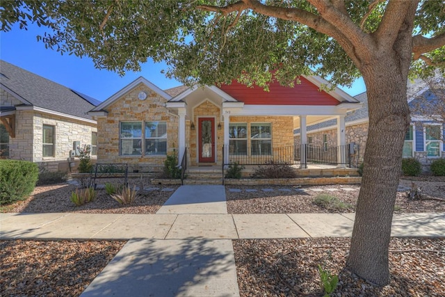 948 Hudson Ln, New Braunfels, TX 78130 - bungalow with stone siding and a porch