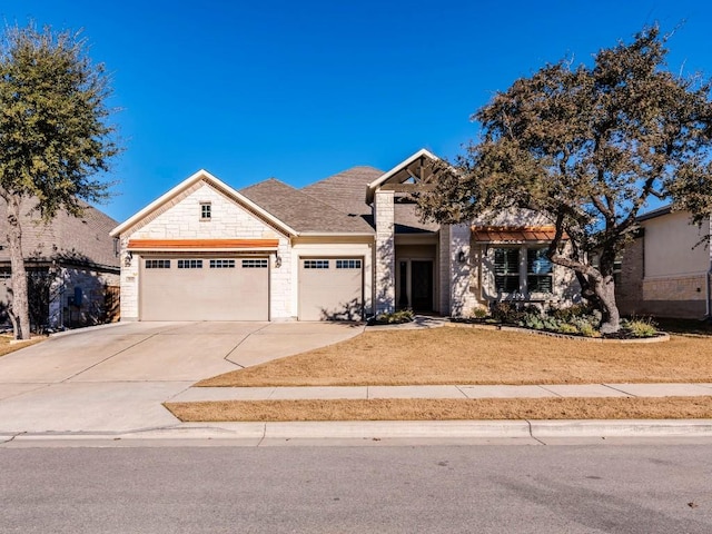 view of front of house featuring a garage and driveway