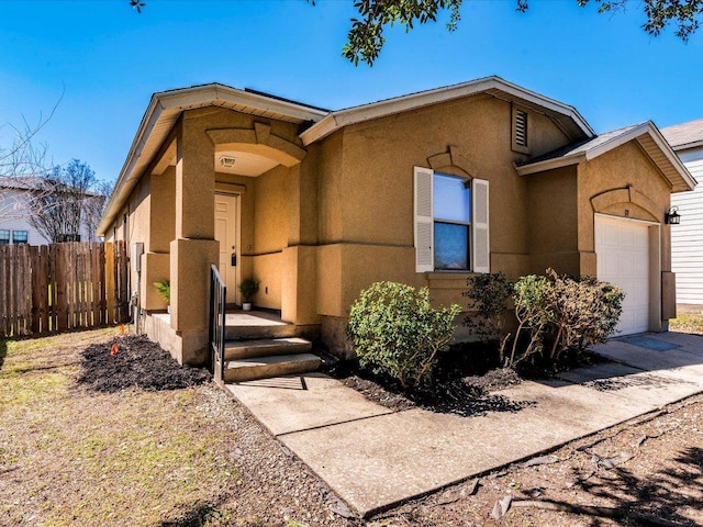 171 Beech Dr, Kyle, TX 78640 - view of front of home with stucco siding and an attached garage