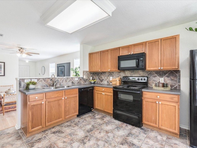 171 Beech Dr, Kyle, TX 78640 - kitchen featuring black appliances, a sink, tasteful backsplash, a peninsula, and a ceiling fan