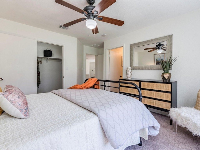 171 Beech Dr, Kyle, TX 78640 - carpeted bedroom with a closet and ceiling fan