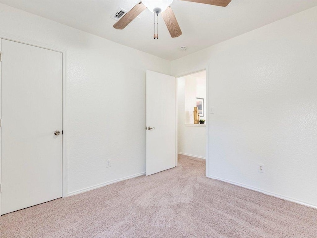 171 Beech Dr, Kyle, TX 78640 - unfurnished bedroom featuring carpet flooring, ceiling fan, and baseboards