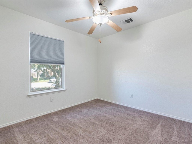 171 Beech Dr, Kyle, TX 78640 - unfurnished room featuring carpet flooring, a ceiling fan, and baseboards